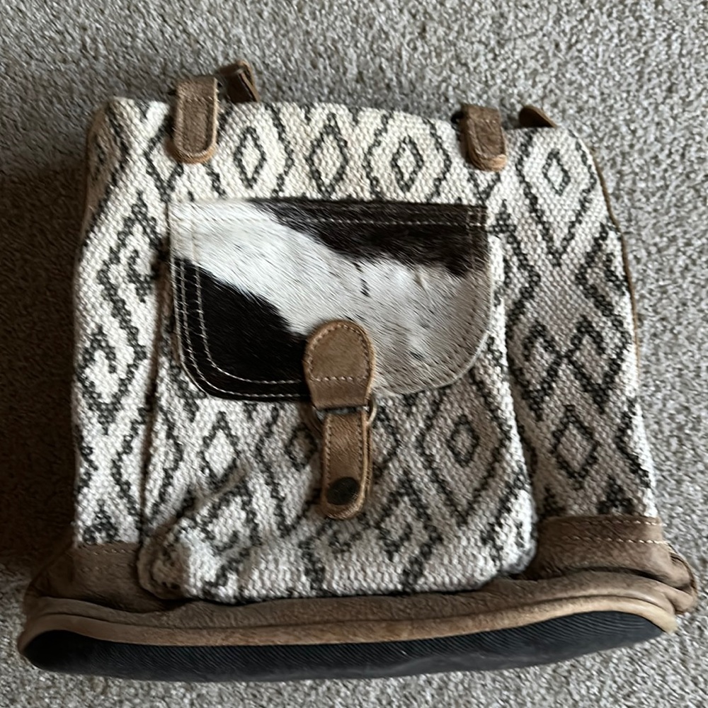Myra Bag mini backpack with cow hide details.